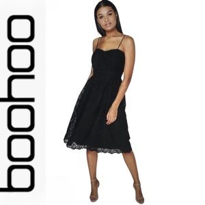 Boohoo.NWT.Gorgeous black “ABIE " Strappy skater dress with lace overlay.Size 4.
